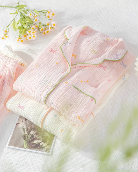 pyjama sets folded with floral patterns on a light background