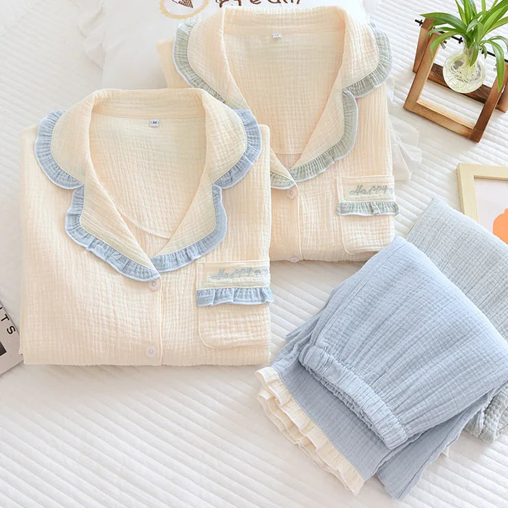 Folded beige and gray clothing on a white surface with 'Ice Cream' branding.