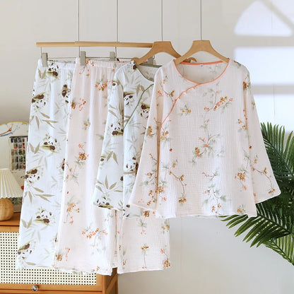 Floral pajama set on a hanger against a neutral background
