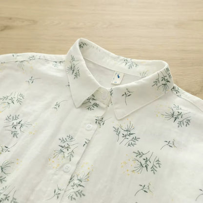 White shirt with floral pattern on a wooden surface