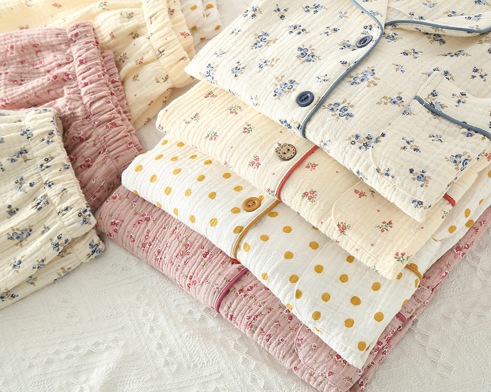 Collection of floral and polka dot women pyjamas on a light background