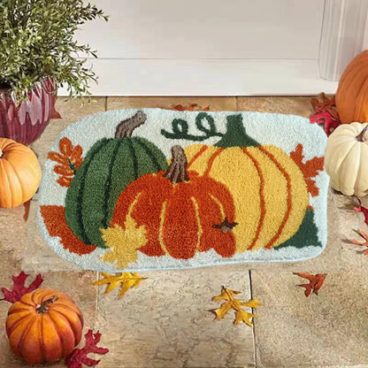 Decorative doormat with pumpkins and leaves on a wooden floor.